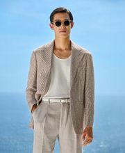 This taupe blazer is cut to a relaxed fit with natural shoulders, featuring notch lapels and patch pockets.