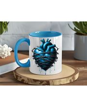 Blaues Herz auf Becher
