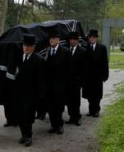 Begrafenisverzorging Den Hollander
Dragers in het zwart van de EVD