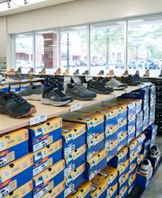 Shot of Popular Brand Section (I.e. Croc Shoe Wall)