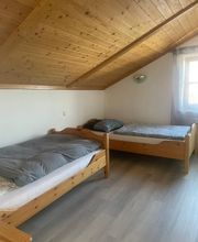 kleineres Schlafzimmer Ferienwohnung oben