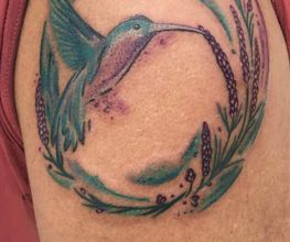 Bunte Leute Tattoo & Piercing Bild 9