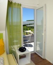 5-Sterne-Ferienwohnung "Elstar" - Wohnbereich mit Terrassenblick