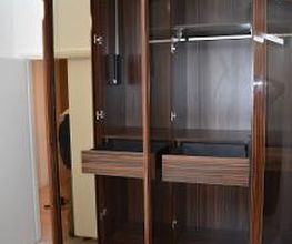 Menuiserie Luquiens - dressing sur-mesure bois - Coppet