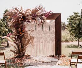 Wedding arch made of wood and flowers