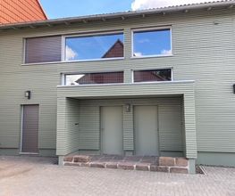 Zweifamilienhaus_Fenster_Aufsatzraffstore_Holzhaustüren.jpg