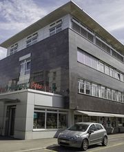 Pharmacie-Amavita-Condémine-bâtiment