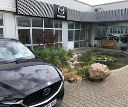 K.H. Moors GmbH Automobile Mazda + Suzuki-Vertragshändler Bild 1