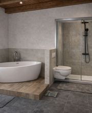 Komplettumbau mit freistehender Badewanne, Dusche und großformatigen Fliesen. Alte Sanitärobjekte raus, neue Leitungen, bodengleiche Dusche und großformatige Fliesen . Alles aus einer Hand koordiniert.
