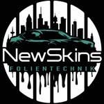 Logo von NewSkins Folientechnik mit runder Form, stilisierter Skyline, Schriftzug ‚NewSkins‘ und dem Zusatz ‚Folientechnik‘