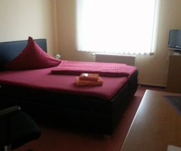 Einzelzimmer mit Doppelbett