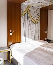 Hotel Albergo Carcani by Ketty & Tommy in Ascona – Modernes Doppelzimmer mit stilvollem Interieur