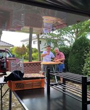 Bäckerbursche feuriges, mobiles Backen Bild 19