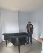 Les Porteurs de L'extreme/ Transport de Pianos et de Coffre Fort image 1