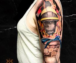 Körperkunst Tattoo & Piercing Bild 17
