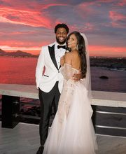 Deana and Reggie celebrating their Cabo Wedding at Sunset Monalisa
