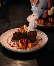 Cue Café Restaurant & Lounge Bar Bild 10