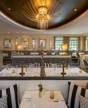 Sterne Restaurant Orangerie: luxuriöse Einrichtung und gemütliches Ambiente