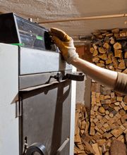 Peter Hauser GmbH für Kaminfegerarbeiten und Feuerungskontrollen Bild 7