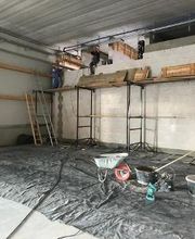 unsicheres Arbeiten auf einem Bockgerüst