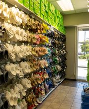 Shot of Popular Brand Section (I.e. Croc Shoe Wall)