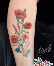 Bunte Leute Tattoo & Piercing Bild 7