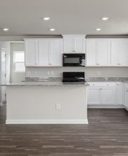 All kitchen appliances are included.