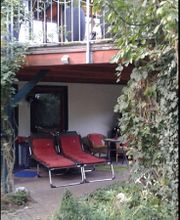 Ferienwohnung Anita Pfeiffer - Grüne Oase Bild 1