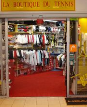 LA BOUTIQUE DU TENNIS à l'intérieur du hall du tennis-club