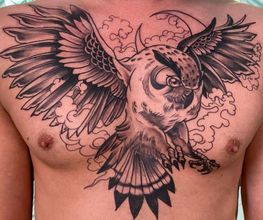 Raketenwacholder Tattoo und Piercing Bild 14