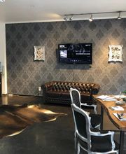 Körperkunst Tattoo & Piercing Bild 1