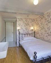 Einzelzimmer ohne Bad im Hostel Alplodge