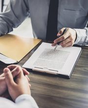 attorney reviewing property damage claim