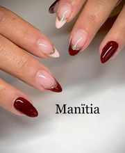 Manitia image 1