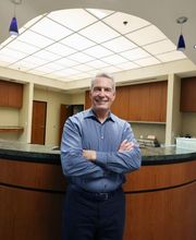 Andrew de Jong, MD, at front desk reception