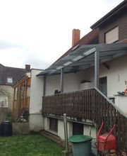 Terrassenüberdachung mit Dachüberstand Schüco PRC 50