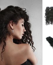 Echthaar-Extensions-gelockt-55cm-Tresse