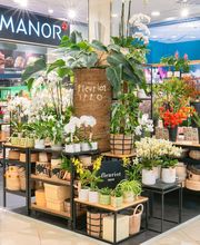 Fleuriot centre Manor Vevey Bild 1