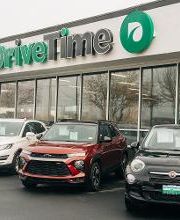 Wide shot of exterior/front of dealership
