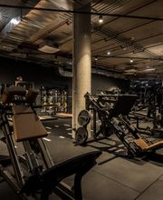 Fitness First München DER Bogen - Plate-loaded Machines