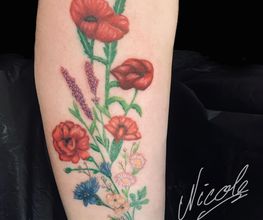 Bunte Leute Tattoo & Piercing Bild 7
