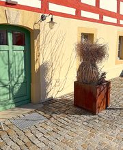 Eingang zur Filiale im Dreiseithof Gröditz