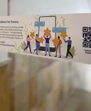 Aufsteller mit QR Code um Feedback zu geben.