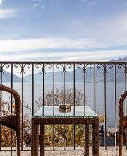Hotel Albergo Carcani by Ketty & Tommy in Ascona – Balkon mit Seeblick auf den Lago Maggiore und die Berge