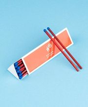 Individuell bedrucktes Streichholzbriefchen in Orange mit klassischer Zündholz-Optik