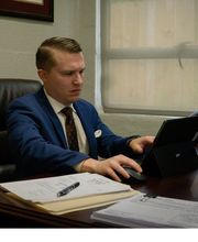 Nick Wright Trusted Criminal Defense lawyer reviewing an ongoing case