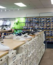 Shot of Popular Brand Section (I.e. Croc Shoe Wall)