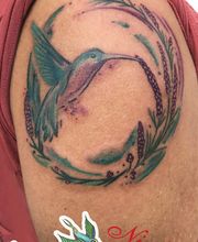 Bunte Leute Tattoo & Piercing Bild 9