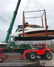 Jährliches Einkranen der Boote an unsere Steganlage