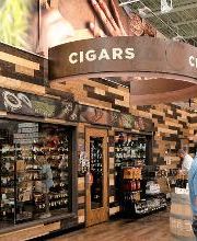 Look for this sign to find our walk-in humidor full of cigars for you to browse.